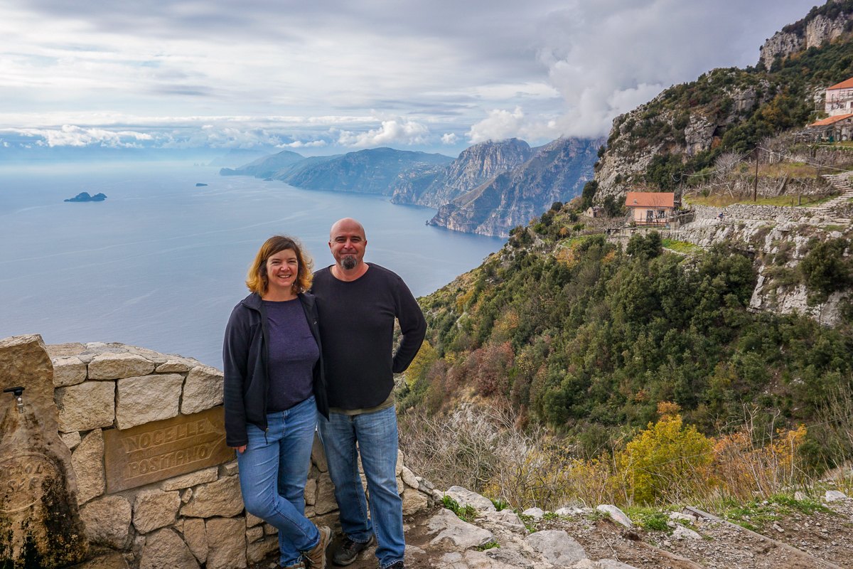 Mairin and Todd on a clifftop above the Amalfi Coast in Italy
